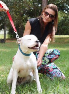 Cassie Ottofaro of The Terrio Group bonds with a special new friend at Nala's New Life Rescue.